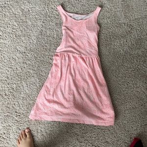 It’s a dress that has pink with a white background